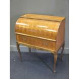 A French style open armchair, 20th century, and a reproduction parquetry cylinder front desk with