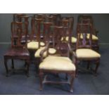 A set of 14 dining chairs including two armchairs (seven with sealskin seats, seven in yellow