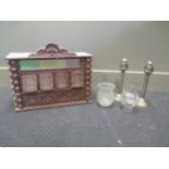 A carved wood and coloured glass box light together with a pair of candlesticks