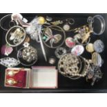 A quantity of silver and costume jewellery