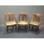 Three 19th century leather upholstered dining chairs