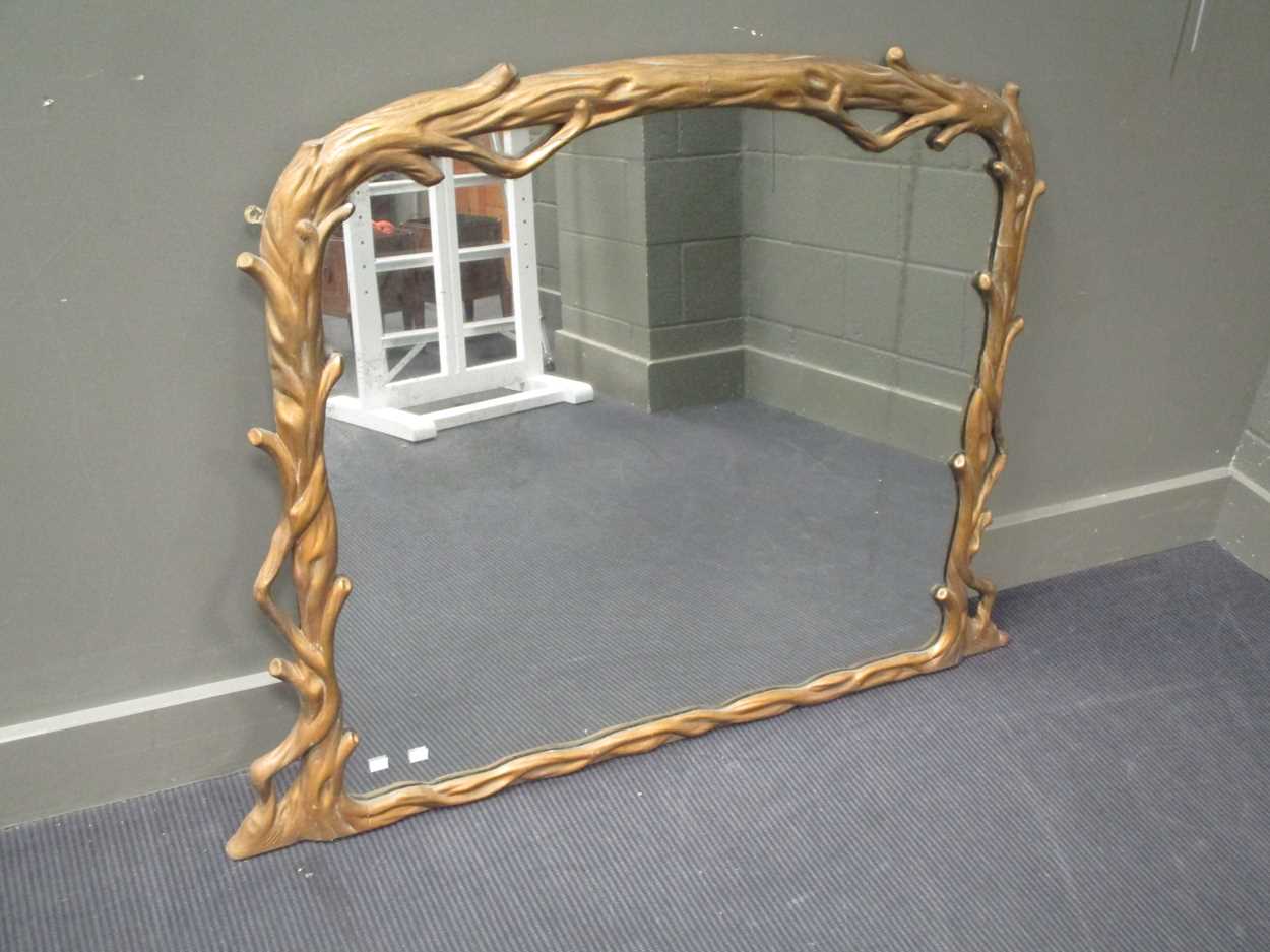 A Victorian gilt framed overmantel mirror in branch form design 96 x 127cm