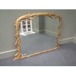 A Victorian gilt framed overmantel mirror in branch form design 96 x 127cm