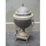 A 19th century copper urn shaped samovar with urn finial and lion ring handles