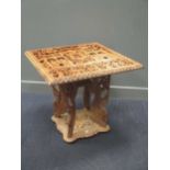 An Eastern carved table, 678 x 67 x 77cm