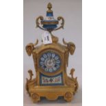 A late 19th century French gilt metal and porcelain mounted mantel clock,