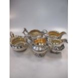 A collection of 5 silver cream jugs, 39.7ozt gross (5)