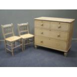 A Victorian painted chest of drawers 93 x 141 x 51cm and a pair of chairs en suite (3)