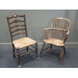 A 19th century elm Windsor armchair and an ash ladder back chair (2)