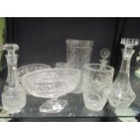 A collection of glassware to include three decanters, three vases, three bowls and six brandy