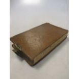 A 19th century leather bound pocket and account book, circa 1830/40, small 8vo