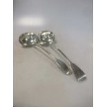 A Georgian and a Victorian silver soup ladle, each 'Fiddle' pattern with oval bowl, 16.2ozt gross (