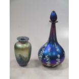 A Siddy Langley glass bottle and stopper together with another iridescent glass vase (indistinctly