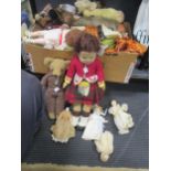 A collection of vintage dolls, including a German bisque headed doll with glass eyes, various