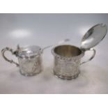 Two Victorian silver drum mustards, one with an earlier spoon and blue glass liner, 8.4ozt gross
