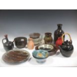 A quantity of studio pottery to include a teapot, various bowls and vases (qty)