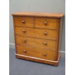 A late Victorian mahogany chest of drawers, with two short over three long drawers, stamped