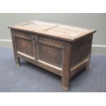 An 18th century oak coffer 59 x 100 x 50cm