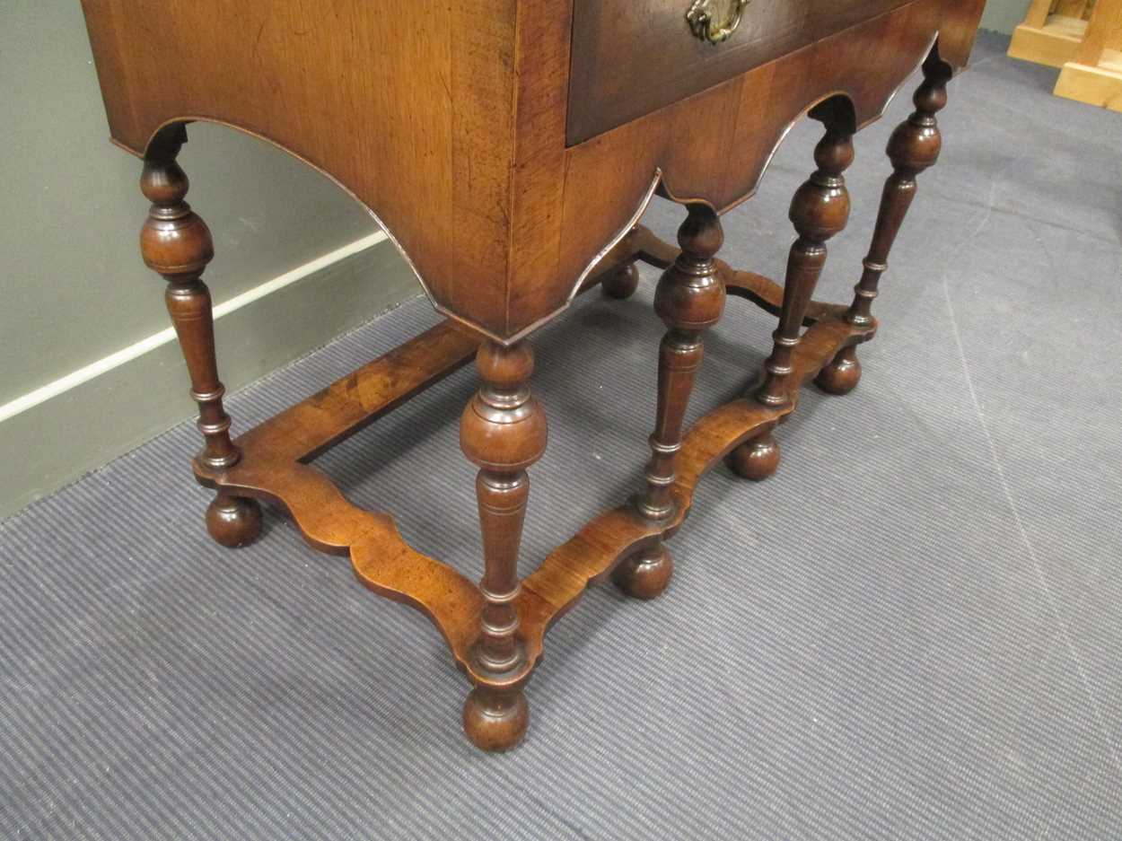 An 18th century style crossbanded walnut cabinet on stand, the two doors over a single long drawer - Image 6 of 9