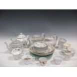 Newhall teapots, tea bowls, plates and a candlestick, together with other ceramics (all in varying