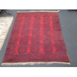 An Afgan rug 330 x 223cm