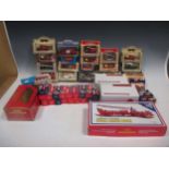 A collection of Corgi, Matchbox and other boxed die-cast cars