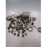 A large collection of thimbles, together with two teethers, some miniature furniture, a hat pin,
