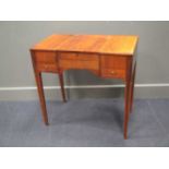 A 19th century continental mahogany dressing table, the top fitted with a central panel concealing a