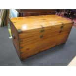 A late 19th century/early 20th century camphor wood blanket chest, with brass bandings and