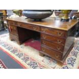 An Edwardian Mahogany partners pedestal desk 73 x 180 x 90 cm.