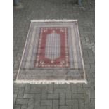 Four Asian rugs, two probably Pakistan and two Caucasian (4)