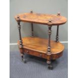 A walnut two tier occasional table with turned supports and drawer to base