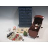 Small and miniature dolls, doll's furniture and accessories, a doll's mahogany cradle, miniature