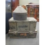 Three tin boxes for military uniforms including hat box and two trunks (3)