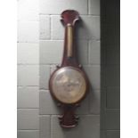 A 19th century mahogany wheel barometer, signed 'J. Vile' with 12inch dial