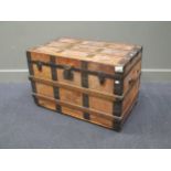 A leather and wooden board travelling trunk with tray interior 87x50