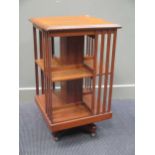 A mahogany revolving bookcase 82 x 49 x 49cm