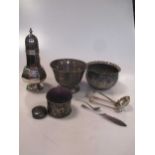 A silver sugar caster, two silver bowls, a small quantity of silver flatware, a pin cushion with