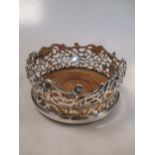 A Victorian silver bottle coaster