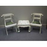 A pair of chairs with matching table (3)