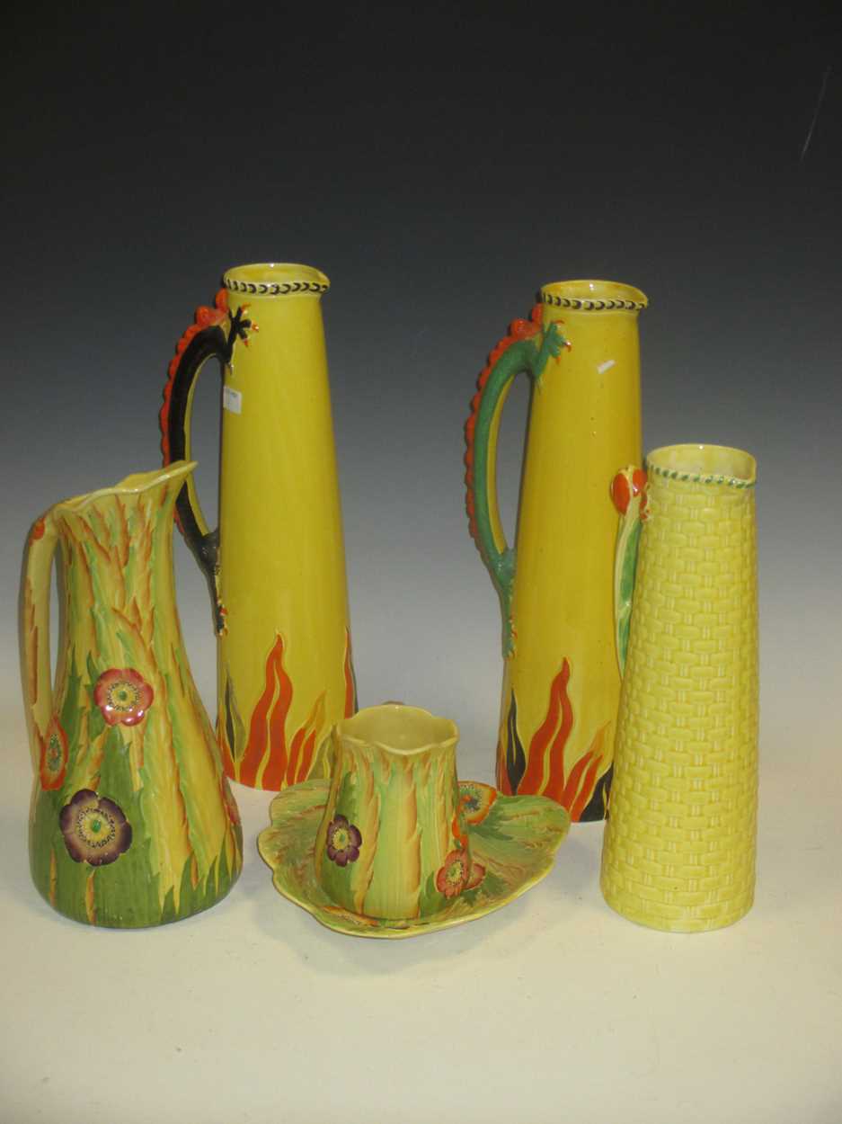 Various early 20th century pottery yellow ground jugs to include Carlton Ware (6)