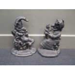 Two modern cast iron punch and Judy doorstops approx 32cm high