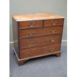 A George III oak chest of drawers, with two short over three long drawers, on bracket feet 88 x 94 x