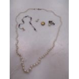 A cultured pearl necklace, together with a freshwater pearl bracelet, two pendants and a pair of