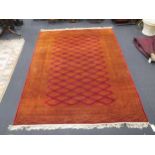 A machine made Afgan style rug 360 x 242cm