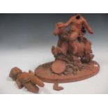 A 19th century terracotta group of putto riding a goat, signed 'J. T. Rod' to base, 37cm high, a/f