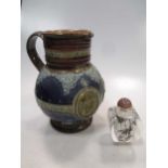 A Doulton Lambeth 1897 Victoria Jubilee jug, 18.5cm high; and a modern snuff bottle