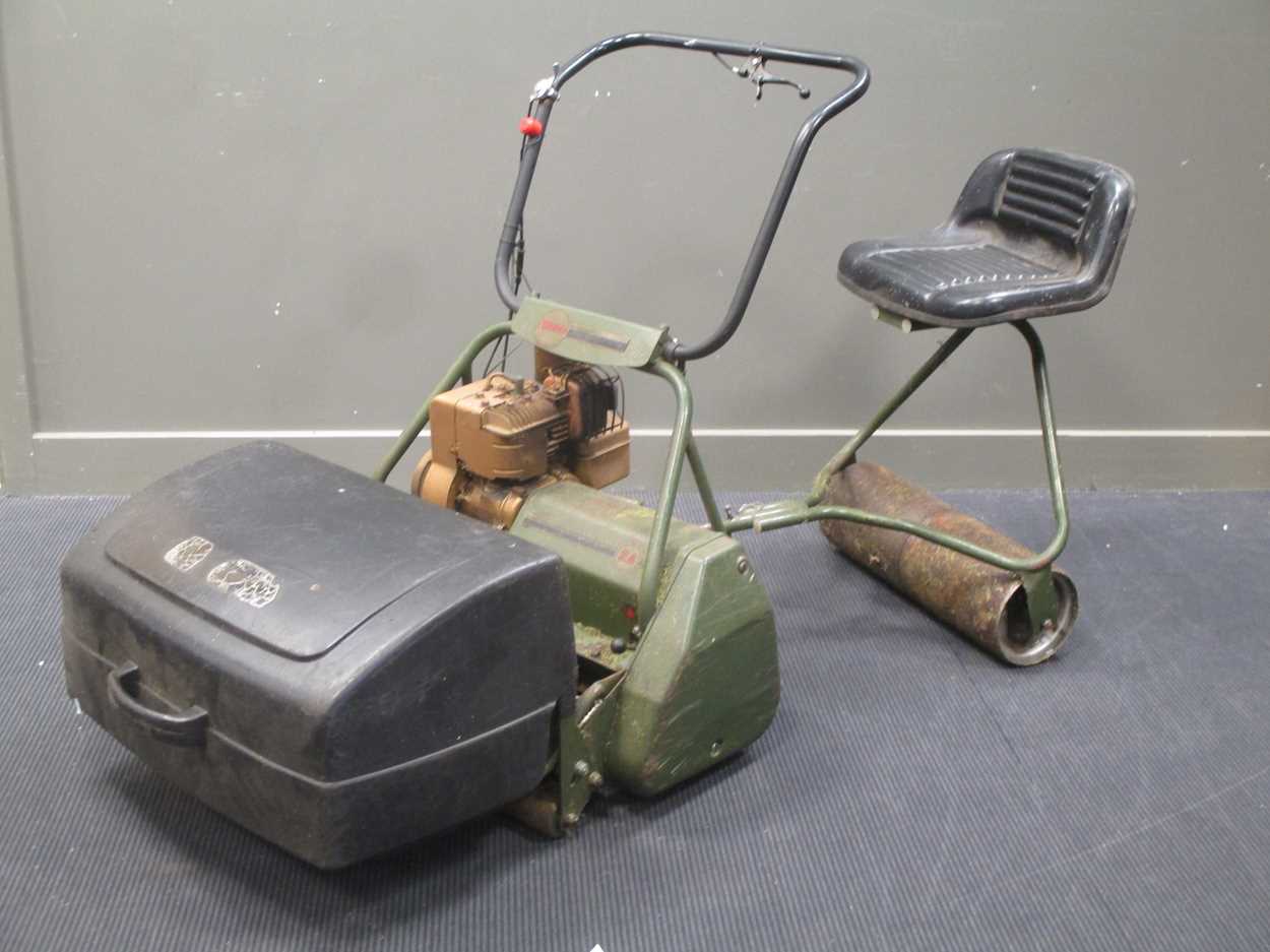 A Webb sit on lawnmower