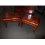 A pair of hardwood low occasional tables,