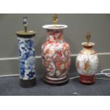 Three oriental vases converted for electricity, to include one blue and white cylindrical vase